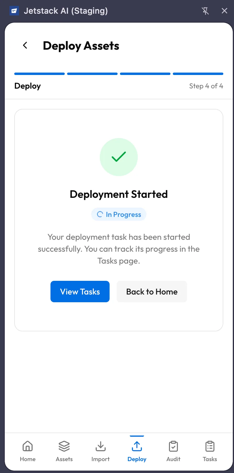JetStack AI extension deploy wizard Step 4 showing real-time deployment progress with asset-level status